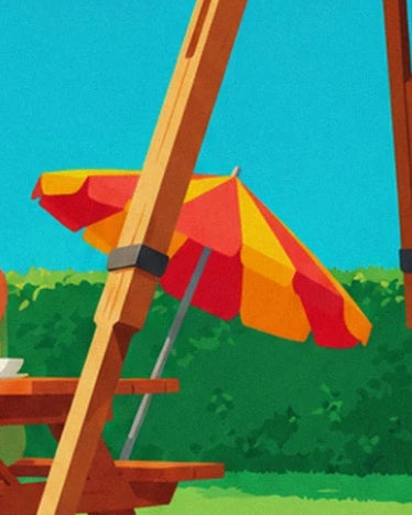 Le pied en bois du trépied devant un parasol rouge et jaune et une table de pique-nique