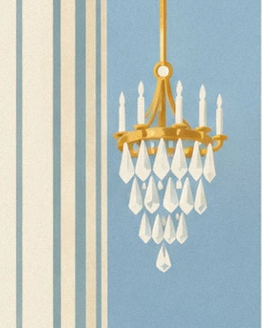 A gold chandelier with white drops against a blue wall with pale mouldings