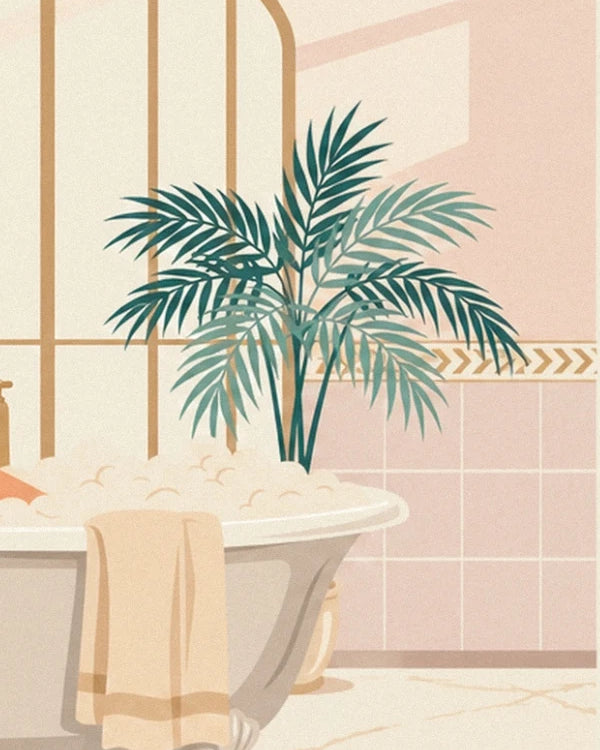 Le palmier vert près de la baignoire, serviette beige sur le bord et carrelage rose