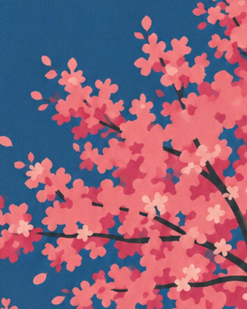 Une branche de cerisier chargée de fleurs roses sur le ciel bleu nuit