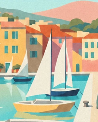 Les voiliers aux voiles blanches devant les maisons colorées du petit port azuréen