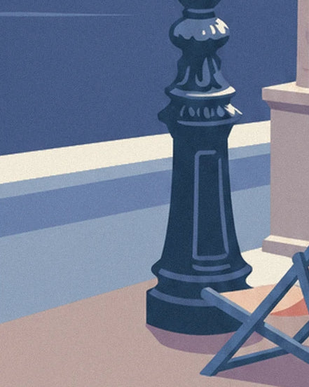 The base of the midnight-blue cast-iron lamppost, beside a deckchair on the promenade