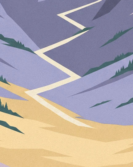 Le sentier clair en lacets sur les pentes mauves et dorées ponctuées de sapins
