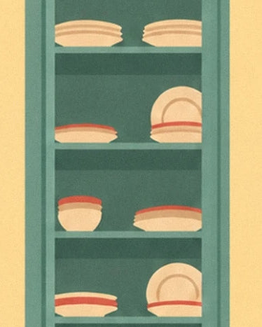 The stacks of cream plates with red rims on the green dresser shelves