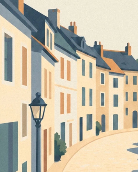 The cream and ochre façades with slate roofs, with a street lamp at the edge of the square