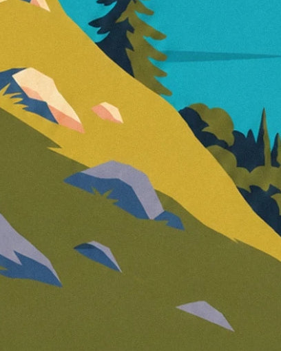 La pente herbeuse parsemée de rochers bleutés au-dessus du lac turquoise
