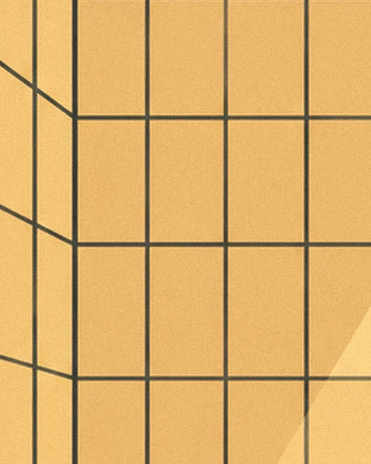The yellow tiles with dark grout, crossed by slanting light