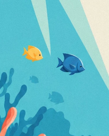 The yellow and blue fish beneath beams of light, above the coral