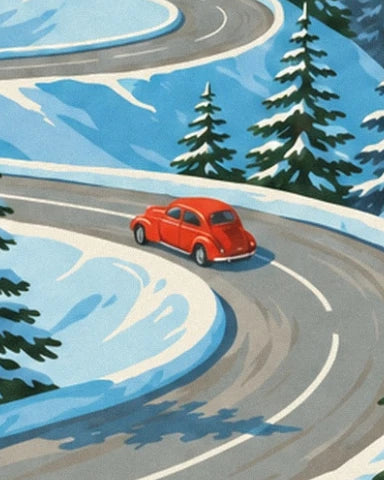 The red car on a bend lined with snow and fir trees