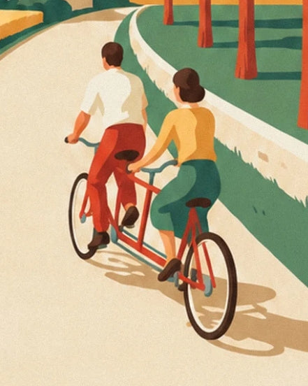 Le couple sur son tandem rouge, entre route crème et talus vert