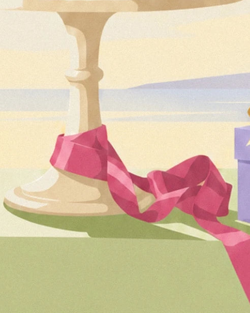The pink ribbon wrapped around the base of a cream display stand on the green surface