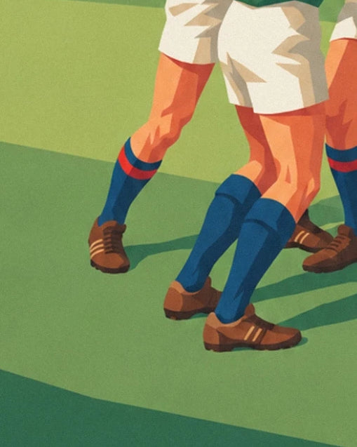 Les jambes musclées, chaussettes bleues et crampons marron, bien plantés sur la pelouse verte