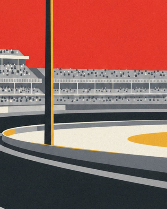 Les tribunes bondées sous un ciel rouge, au bord de la piste crème et du virage bordé de gris