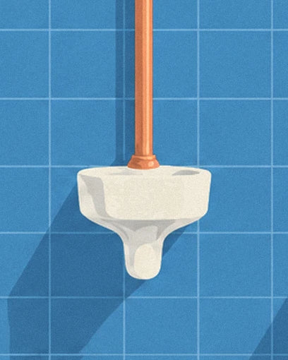 The white urinal and its copper pipe against the blue tiles in the toilets