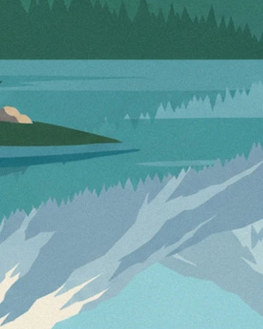 The reflections of the snow-covered mountains and forest in the turquoise waters of the lake