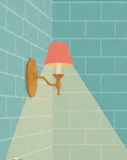 The gold wall light with a red shade and its beam of light on the turquoise tiles
