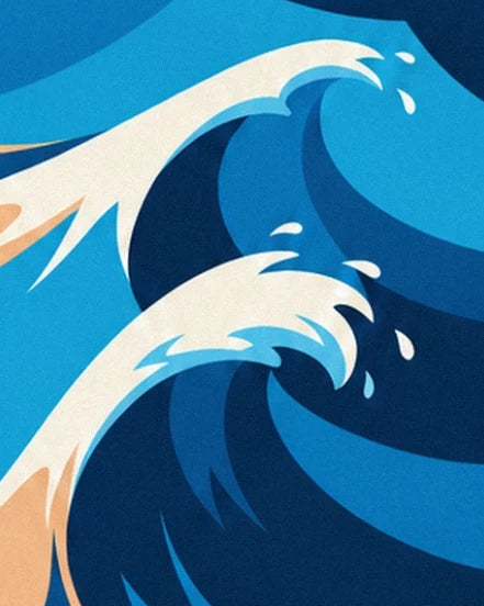 Navy-blue waves with white foamy crests and droplets hanging in the air