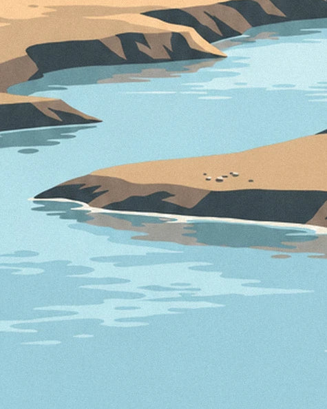 The pale blue channels between the sandbanks scattered with small pebbles