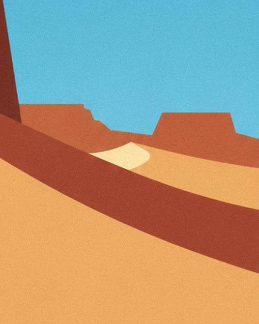 Les mesas rouges au loin et l'ombre brune qui barre les dunes dorées de la crête