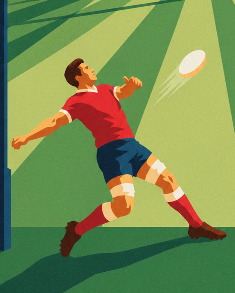 Le buteur en maillot rouge et short bleu, bras tendus, suit son ballon des yeux