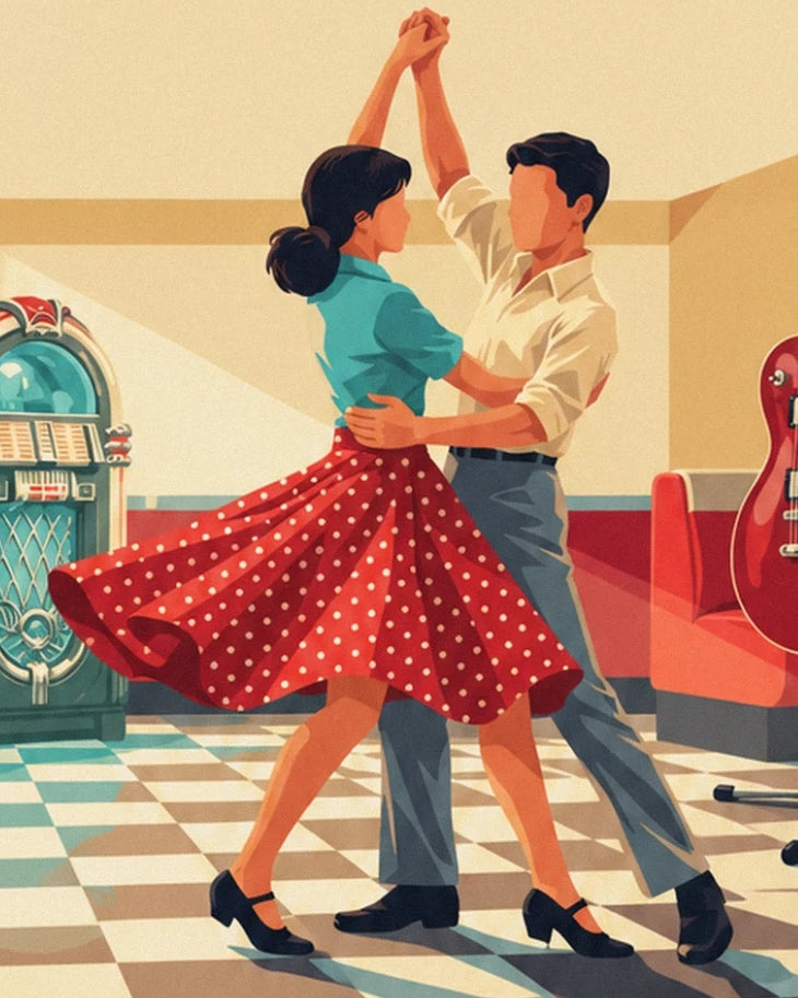 The dancing couple in a red polka dot skirt and cream shirt beside the jukebox