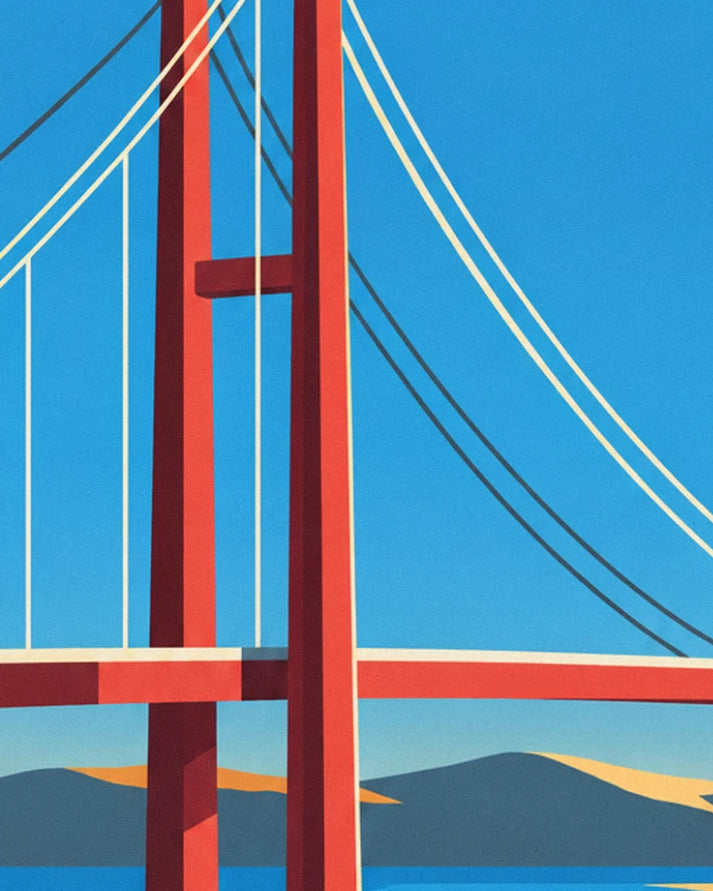 The bridge's red towers and suspension cables, against a blue sky