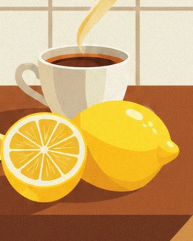 A whole lemon and a lemon half in front of a cup of steaming coffee