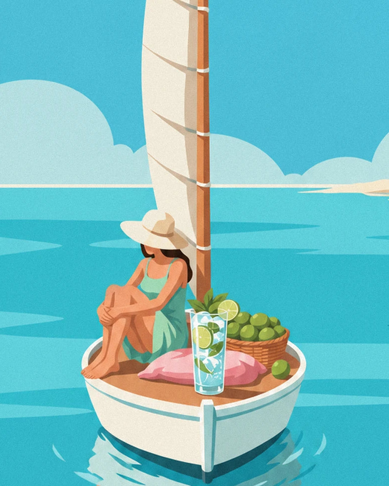 Woman in a straw hat on deck, with her mojito and a basket of limes