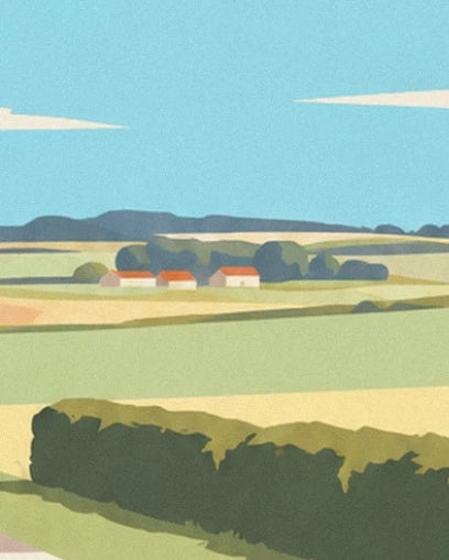 The red-roofed houses between green and golden fields, behind a dark hedge