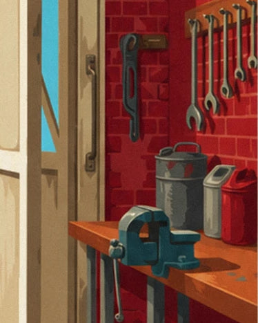 Wooden workbench with a blue vice, cans and spanners hanging on the red brick wall