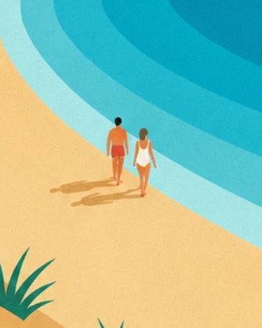 The 2 walkers in swimwear between the golden sand and turquoise water
