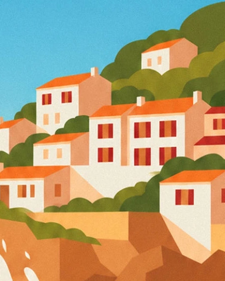 The white houses of Guéthary with orange roofs and red shutters among the trees