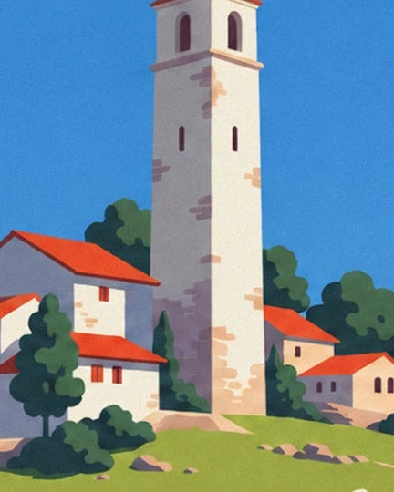La haute tour en pierre claire parmi les maisons aux toits rouges et les arbres