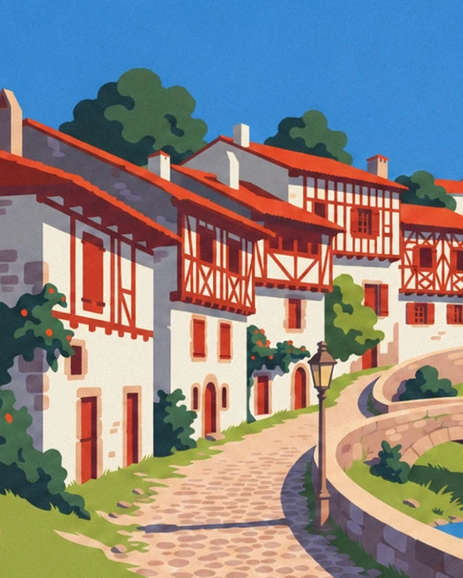 Les maisons basques aux colombages rouges, le lampadaire et la ruelle pavée