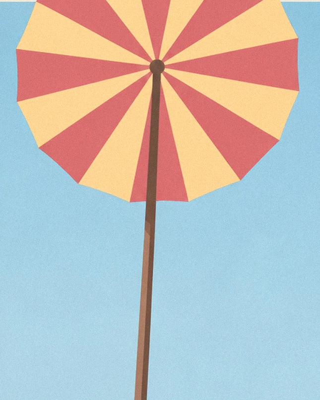 A large red and yellow striped parasol outlined against the pale blue sky