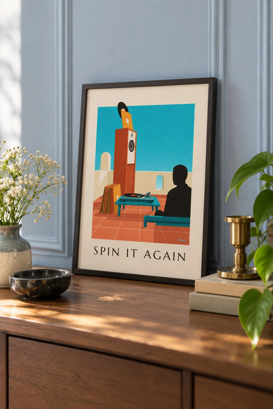 Poster of a record player and a spinning vinyl: small framed A4 size