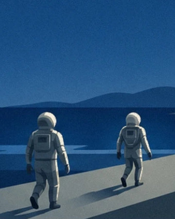 Les 2 astronautes en combinaison blanche sur une allée du pas de tir