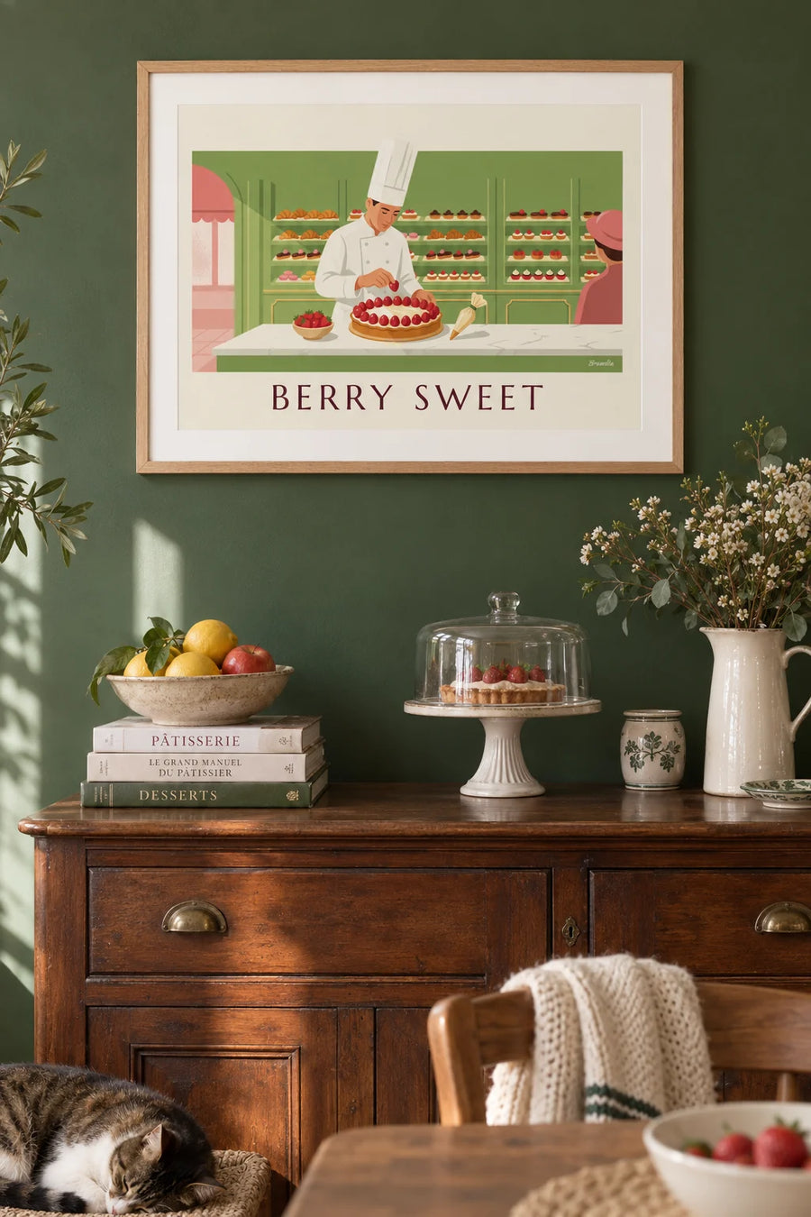 Poster of a pastry chef and a large strawberry tart: framed on the wall