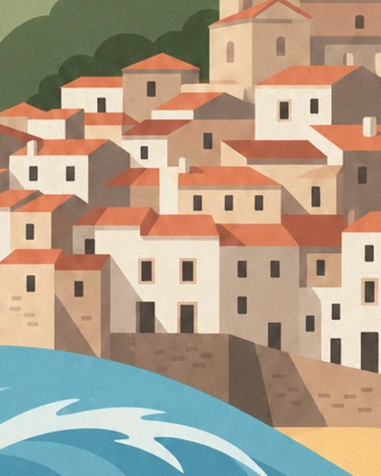 The houses of Mundaka with orange roofs behind the quay and the blue wave