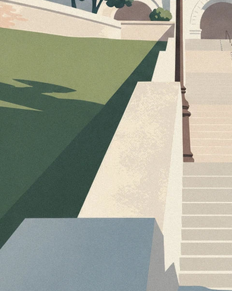 L'escalier bordé d'un muret crème, de réverbères et d'une pelouse aux ombres marquées