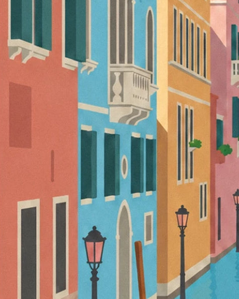 The red, blue and ochre façades with their white balcony and 2 street lamps