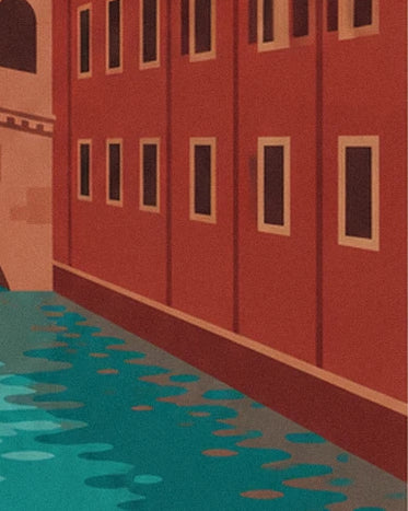 The red façade with cream-framed windows and turquoise reflections on the canal in Venise
