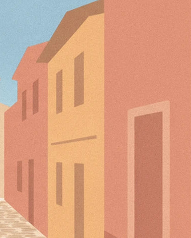 Ochre and pink façades with narrow windows along the cobbled lane