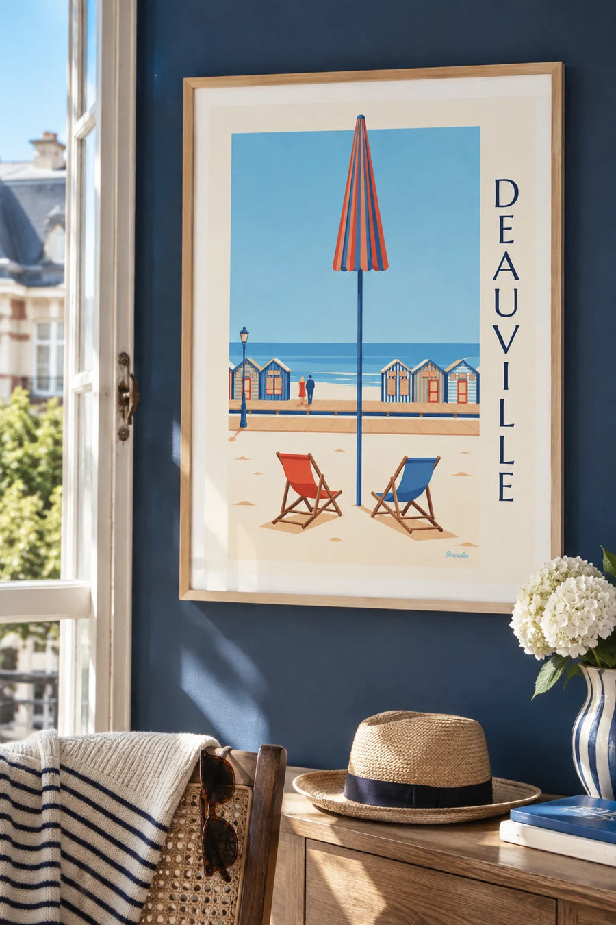 Poster of beach cabins and deckchairs in Deauville: framed on the wall