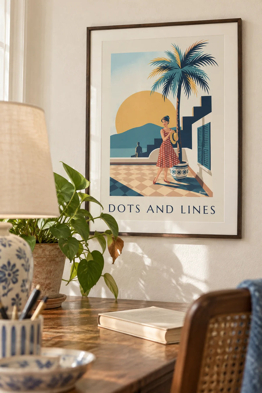 Poster of a woman in a polka dot dress and geometric shapes: framed on the wall
