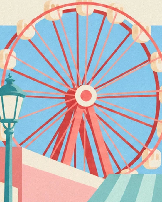 La grande roue rouge aux nacelles crème derrière un réverbère vert