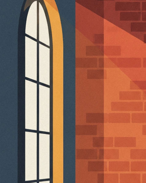 The large arched window with dark frames against a red brick wall bathed in light