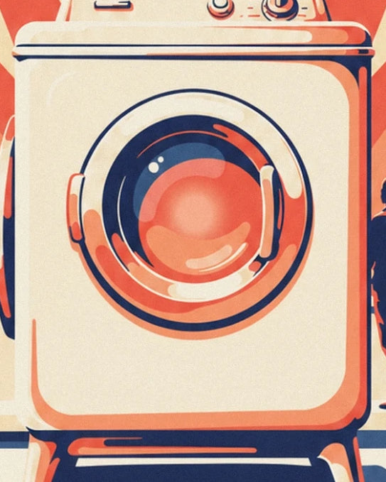The cream washing machine and its round door with coral and navy blue reflections