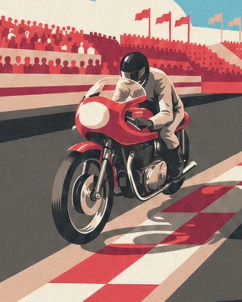 The rider in pale leathers on his red motorbike, beside the chequered track