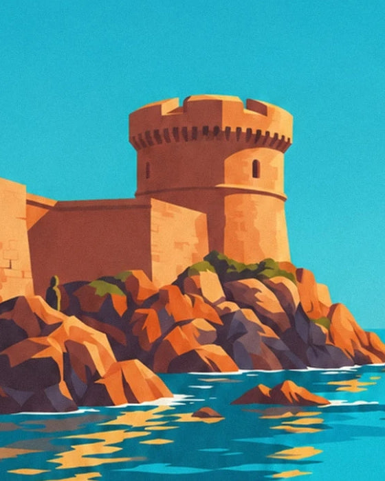 La tour crénelée du fort de Socoa sur ses rochers aux teintes orangées